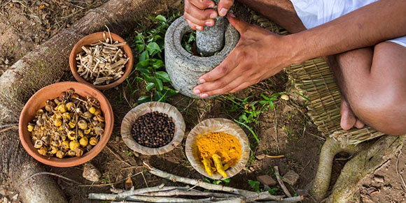 a man making medicine